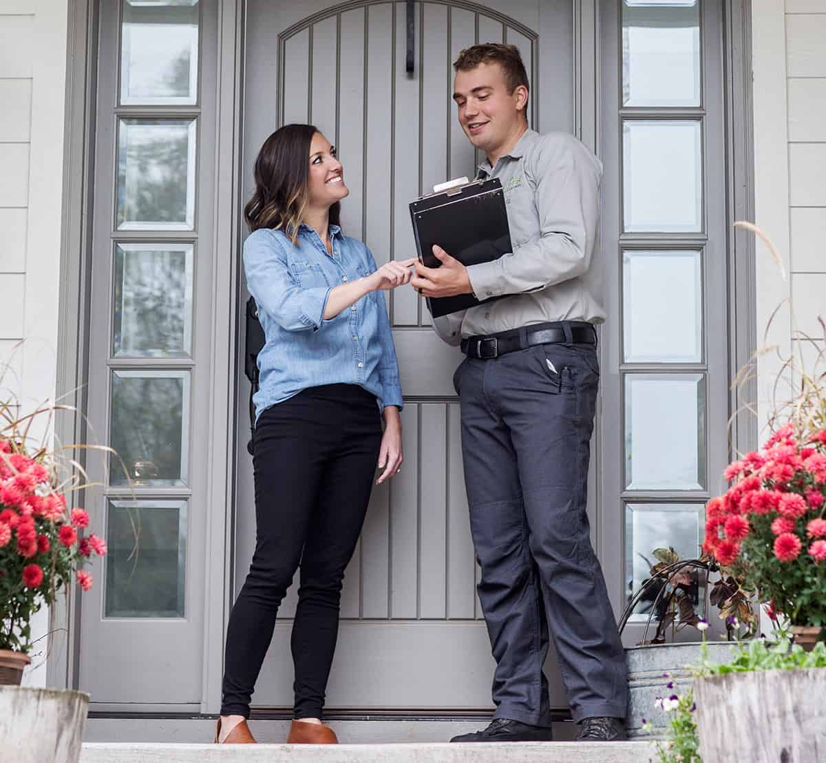 Aspen Pest Control Technician Giving a Free Pest Control Consultation to Vancouver WA Homeowner Aspen Pest Control Technician Giving a Free Pest Control Consultation to Vancouver WA Homeowner
